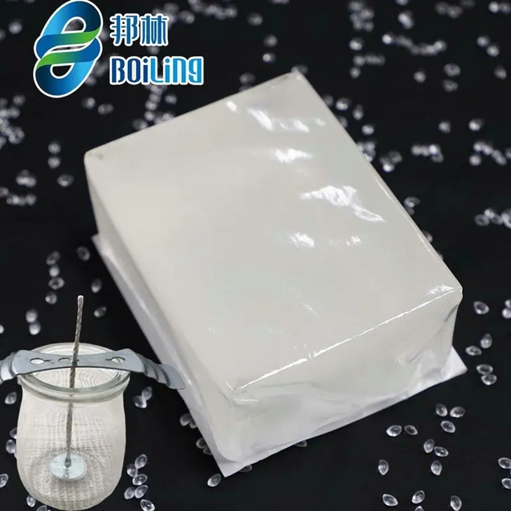 Varmelim til fastgørelse af stearinvæge